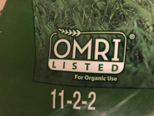 Organic lawn fertilizer package with fertilizer ratio of 11–2–2