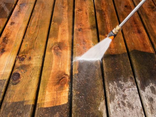 Pressure washing wood deck